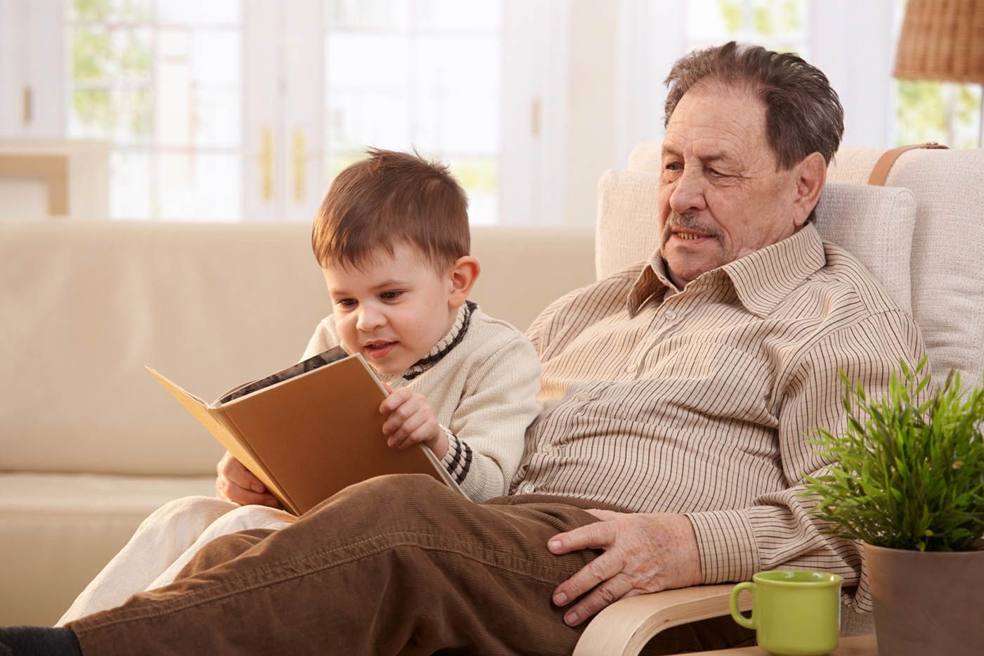 Caregiver holding a client's hand comfortingly